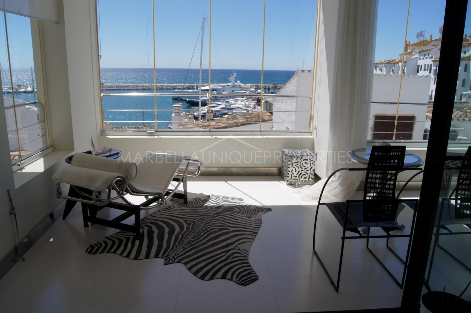 A completely refurbished 2 bedroom penthouse with sea views for sale in Puerto Banus, Marbella