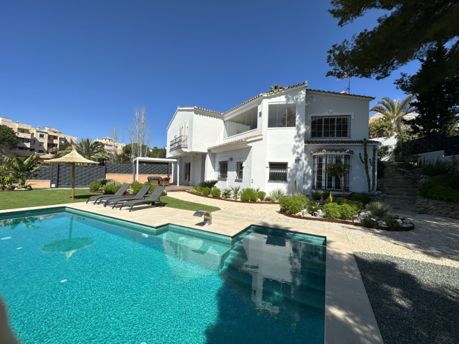 A stylish fully renovated 5 bedroom villa with partial sea views in Elviria, Marbella East